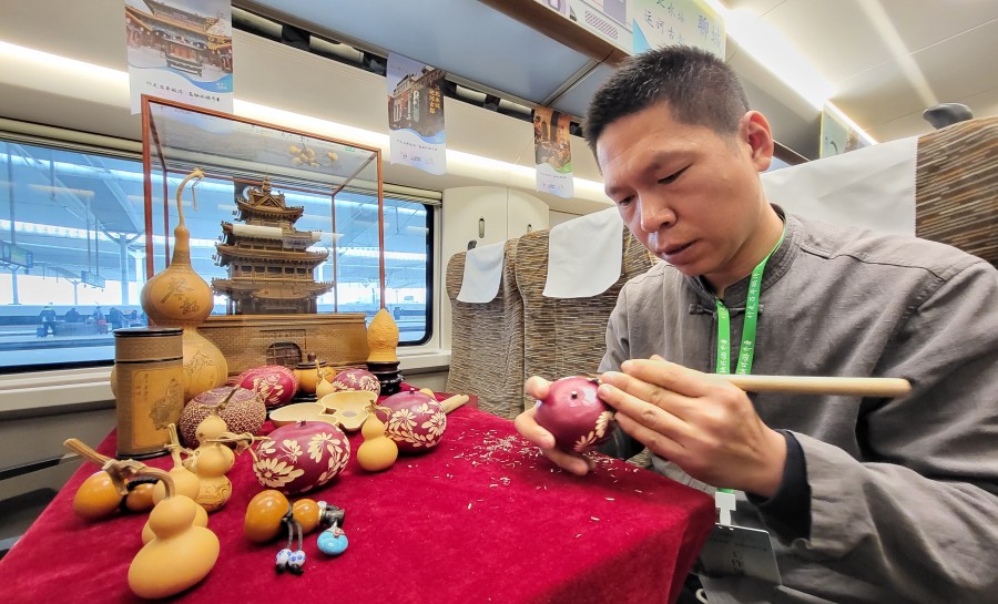 給永偉要新稿（頭版）乘環行高鐵 趕&ldquo;文旅(3470229)-20230319151011.jpg